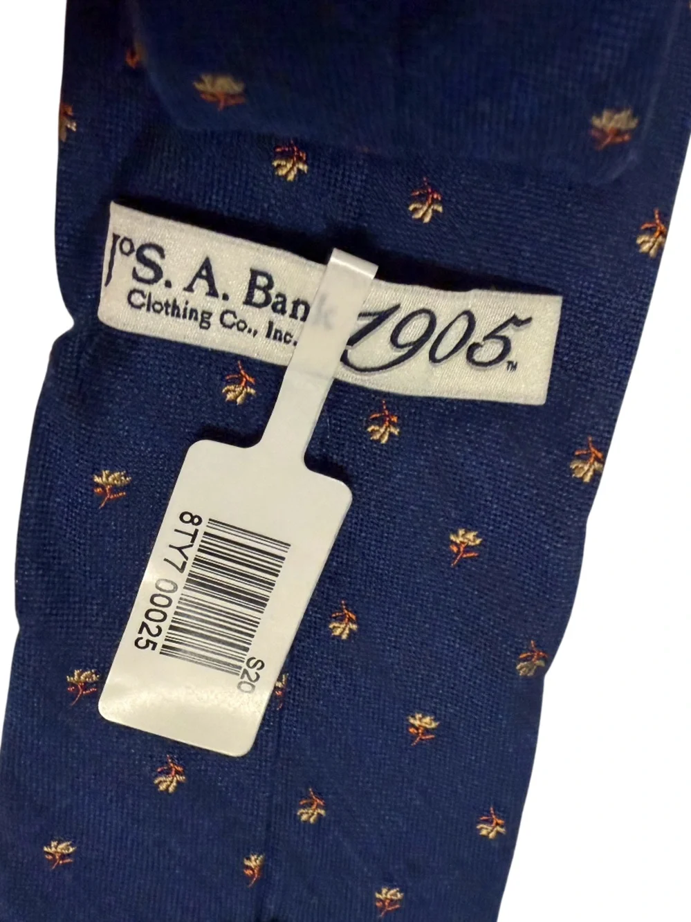 Jos. A. Bank Navy Tie with Small Gold Floral Motif